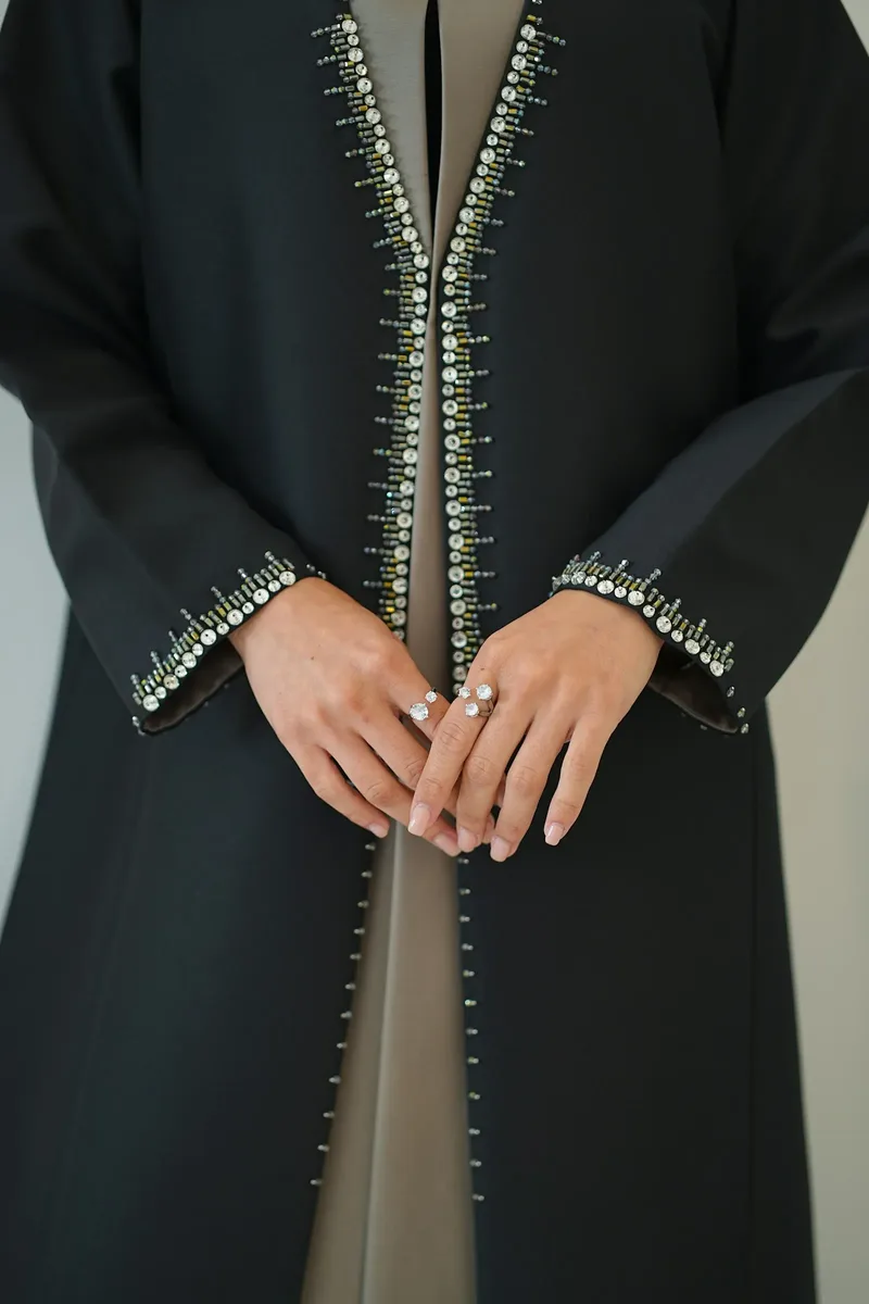 Pearl and bead detail on an abaya sleeve